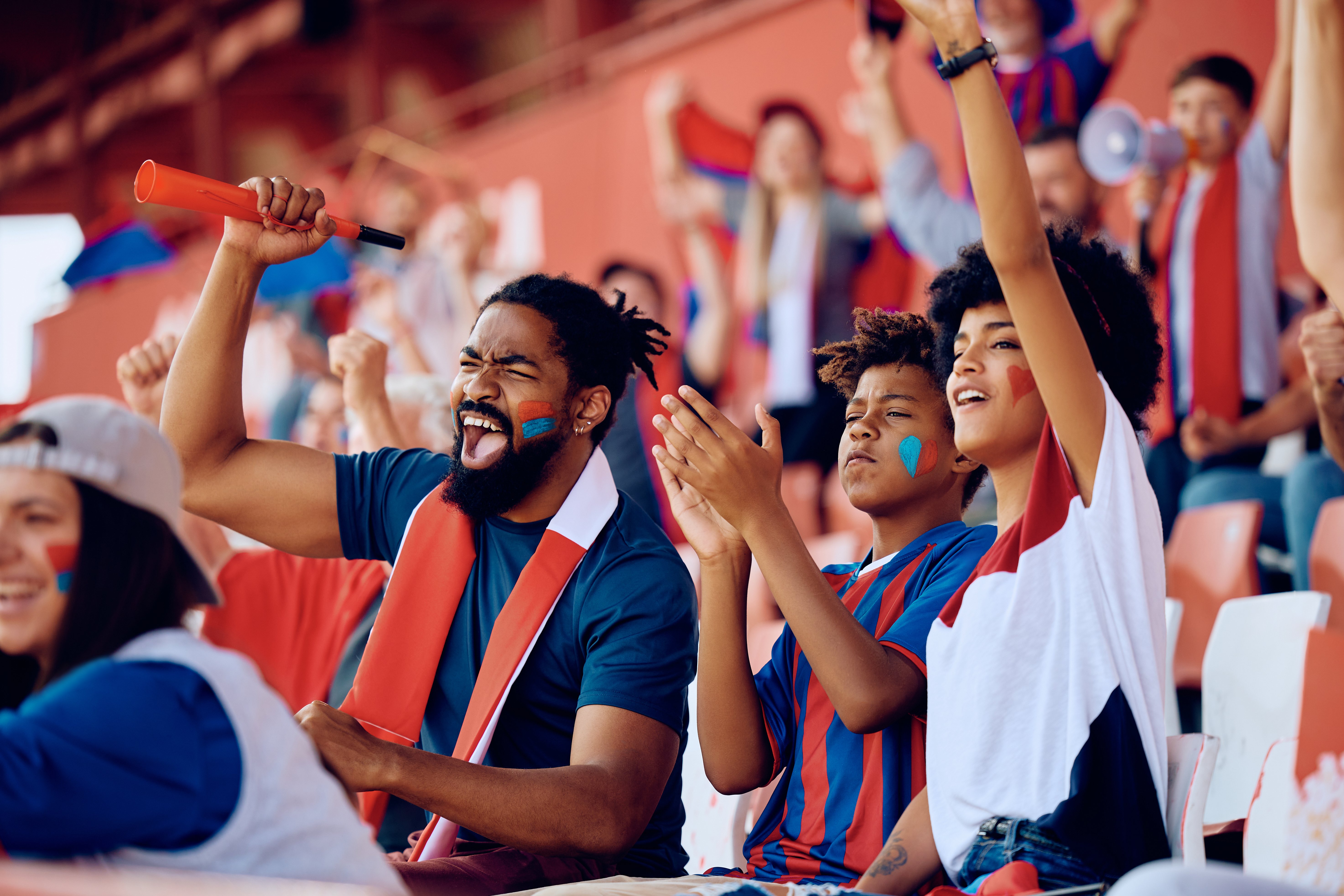 Family cheering at sports event